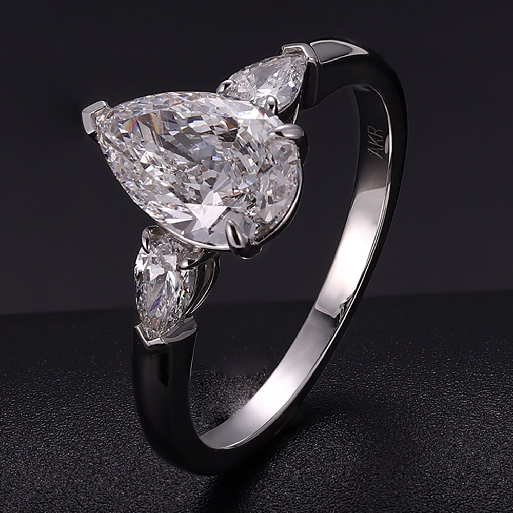 Breathtaking 2CT Pear Cut Lab Diamond Three Stone Ring