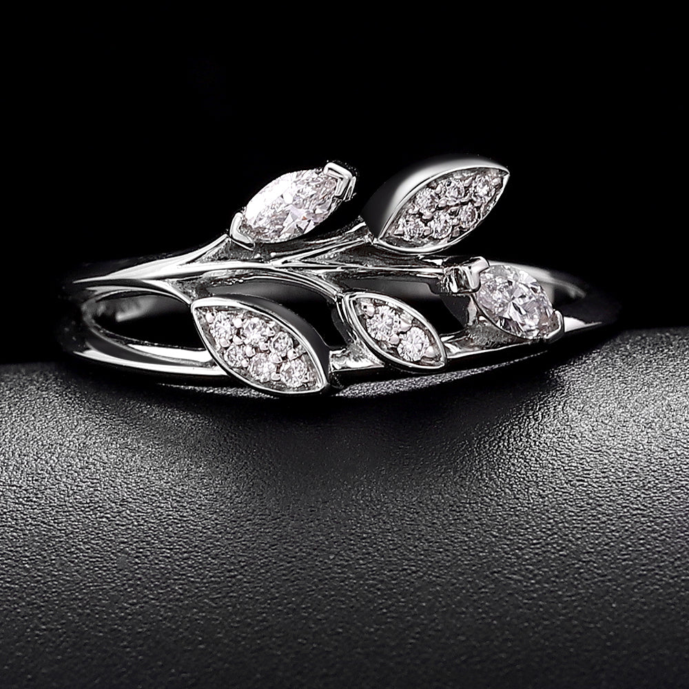 Olive Vine ring set with round and marquise lab grown diamonds