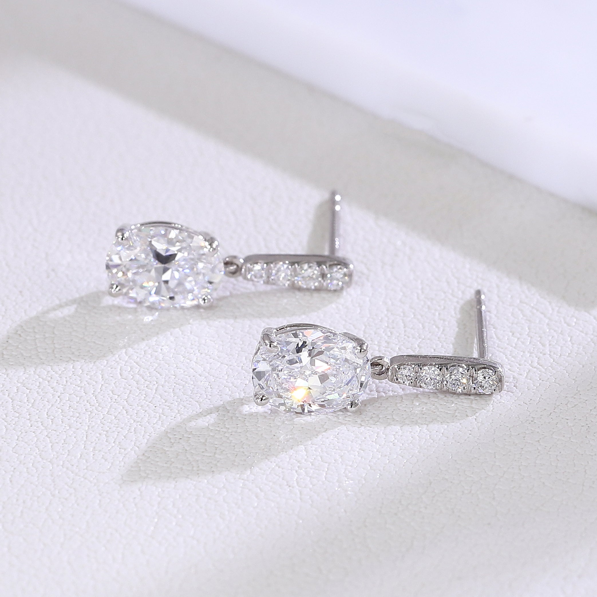 Oval Cascade Drop Earrings | Oval-Cut Lab Diamond in 18K White Gold with Diamond Arc Accents