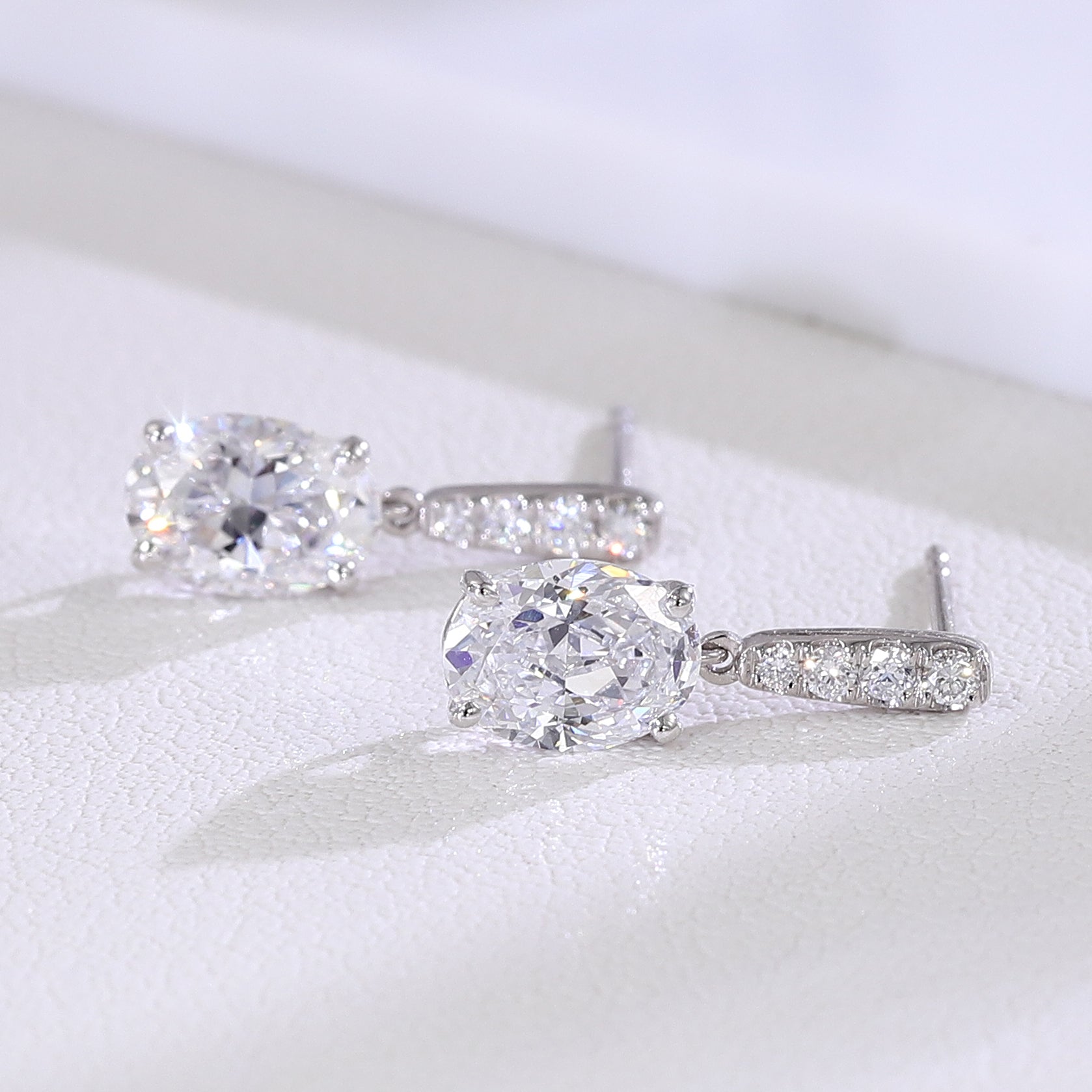 Oval Cascade Drop Earrings | Oval-Cut Lab Diamond in 18K White Gold with Diamond Arc Accents